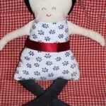 black apple doll
