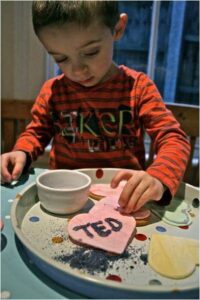 valentines baking 2 Easy Conversation Heart Cookies. How to make Love Heart Cookies. Homemade Conversation Heart Treats to give to Classmates. Valentines Day Ideas for Kids