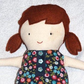 black apple doll