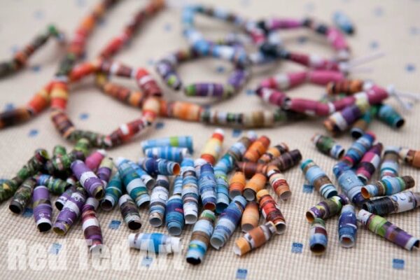 How to make magazine beads - a wonderful activity for kids- make friend bracelets, decorative frames whilst teaching about recycling. jpg