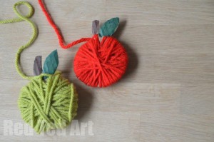 Yarn Wrapped Apple Crafts for Kids - 20 Apple Crafts for Fall - these Apple DIY ideas are just so cute.  The kids will love to go?  Will it be apple-print wreaths, yarn-wrapped apple garlands or this adorable Paper Plate Apple and Worm?  Great Apple Crafts for preschoolers to discover and try!