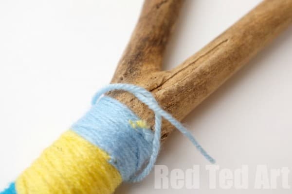 Beach Crafts - Yarn Wrapped Sticks Musical Instrument DIY - tie a knot on itself to finish