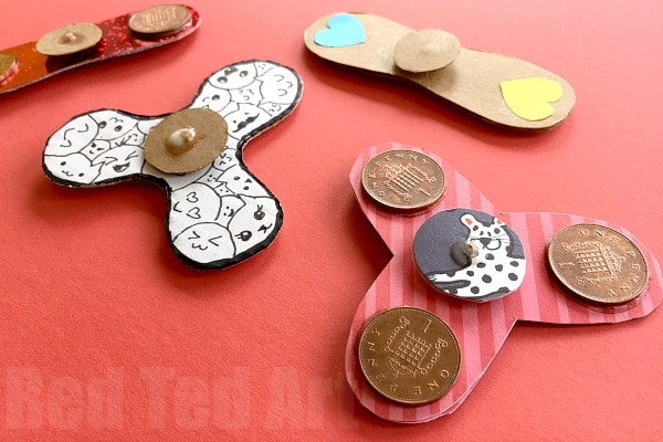 Easy Fidget Spinner DIY (Free Template) - here is a great how to make Fidget Spinners without bearings DIY. The use super basic materials and are easy to make. It includes a Free Fidget Spinner Template (3 designs) and would be great Science Fair project idea (exploring property of materials, centrifugal forces and friction). Making this a fabulous STEAM project for kids, which is Cheap, Easy and Fun. Come make a simple Fidget Spinner DIY project with us today!!