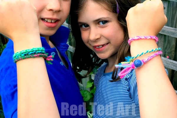 Young children with homemade friendship bracelets