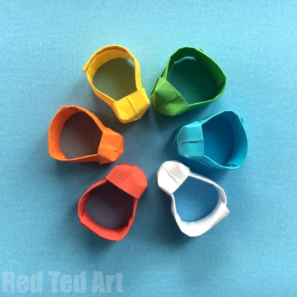 Easy Origami Ring DIY - Red more fun with paper.  Look how FUN these little paper rings are!  A great origami pattern for beginners.