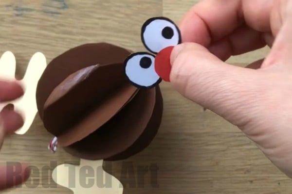 Paper Rudolph Ornament - Love Rudolph? Check out this cute Paper Rudolph Bauble? How cute and fun is he? A great Paper Ornament for kids to make this Christmas. LOVE Christmas Crafts. Quick and easy to make. #Rudolph #rudolphornament #ornament #christmas #paper #papercrafts #papercraftsforkids