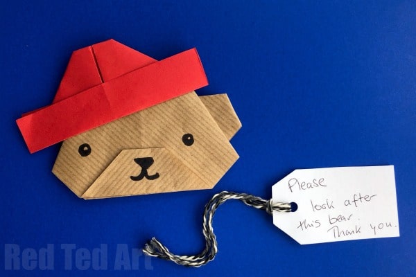 Easy Paper Paddington Bear Craft - Oh my, how cute is this Origami Bear?  Not just any bear... but Origami Paddington Bear?  love love love.  If you like Paddington and the Paddington bear movies, try these pretty little paper crafts for kids. Wouldn't they make great Paddington party invitations?!