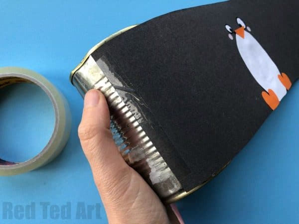 DIY Penguin Pencil Holder - teehee, how cute are these little Penguin Desk Tidies? A great 5 minute craft to decorate for Winter!! Love upcycling in this way. #pencilholder #penpots #desktidies #penguin #penguindiy #winter #winterdecor #wintercrafts #5minutecrafts