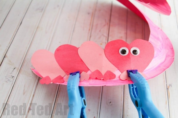 Love Bug Paper Plate Twirler. Oh my, this is such a super duper CUTE Valentine's Day Craft for Preschoolers. We love exploring shapes and creating our own LOVE BUGS.. and we love a Paper Plate Whirligig craft.. #valentines #valentinesdecoration #preschooler #whirligig #twirler #paperplate