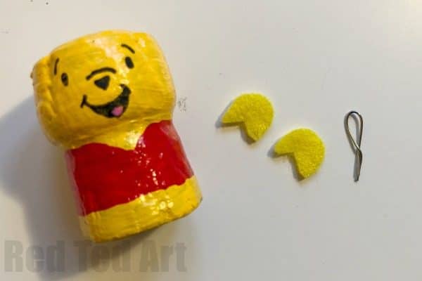 DIY Winnie The Pooh Ornament Craft. How to make a Cork Pooh Bear Ornament for Christmas. Cork Christmas Ornament Keepsakes #Poohbear #WInniethepooh #corks #ornaments #keepsakes
