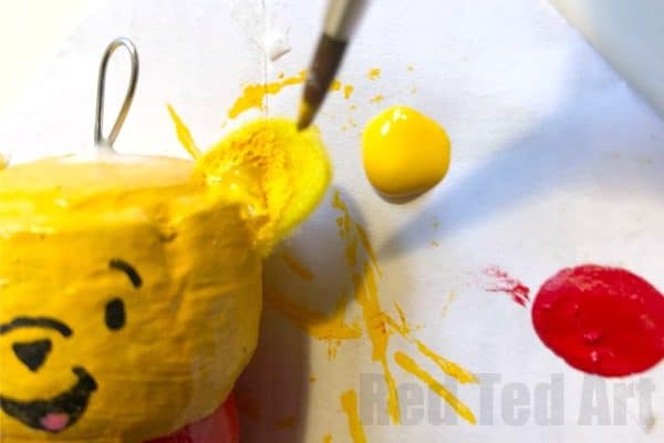 DIY Winnie The Pooh Ornament Craft. How to make a Cork Pooh Bear Ornament for Christmas. Cork Christmas Ornament Keepsakes #Poohbear #WInniethepooh #corks #ornaments #keepsakes