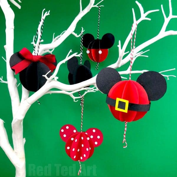 41 Easy Christmas Paper Crafts to Make for the Holidays: Paper Mickey Mouse Ornament DIY. How to make a Homemade Mickey Mouse Ornament for Christmas. Includes free printable. Disney Christmas Crafts for Kids