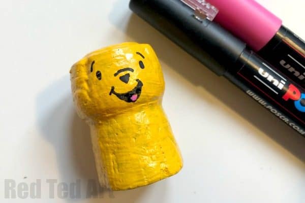 DIY Winnie The Pooh Ornament Craft. How to make a Cork Pooh Bear Ornament for Christmas. Cork Christmas Ornament Keepsakes #Poohbear #WInniethepooh #corks #ornaments #keepsakes