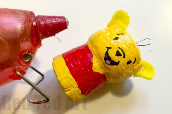 DIY Winnie The Pooh Ornament Craft. How to make a Cork Pooh Bear Ornament for Christmas. Cork Christmas Ornament Keepsakes #Poohbear #WInniethepooh #corks #ornaments #keepsakes