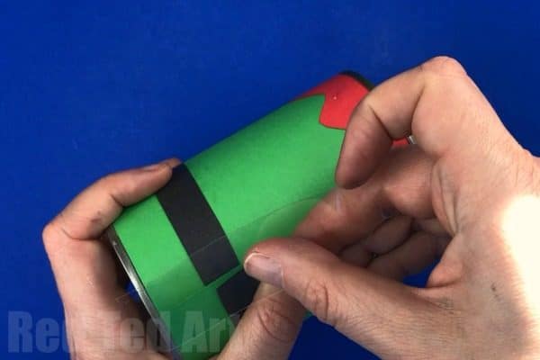 Easy DIY Elf Desk Tidy and Elf Pencil Pot. How to make a Christmas Desk Tidy from Tin Cans and Paper. Easy Elf Christmas Decor for kids