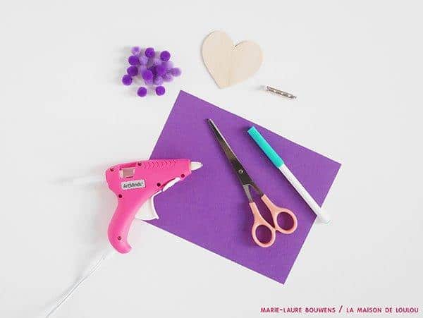 A cute Valentine's Gift for Kids to make - easy Heart Pom Pom Pin! An easy Kids' Valentine's Day Craft to keep or give to a loved one. #valentines #pompoms #hearts #gifts