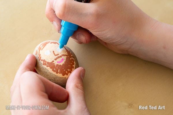 Kid painting father's day rock art