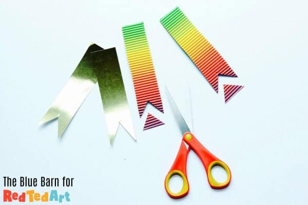 Cutting the ribbon for the Father's Day Medals made from jar lids