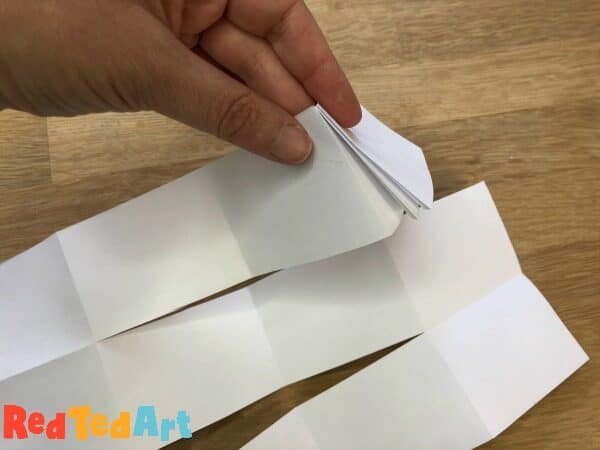 Folding your zig zag paper to make a no glue mini notebook