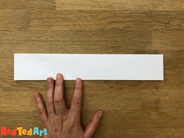 Fold your sheet of paper length wise for notebook guidelines