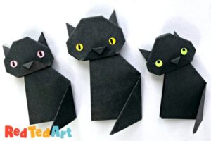 3 little black cats made from origami paper