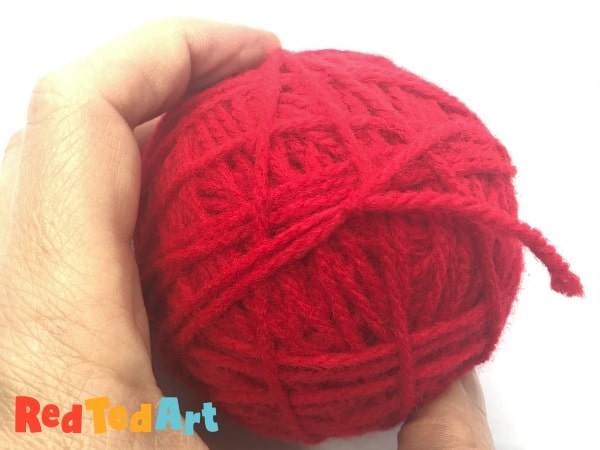 knotting the yarn to secure it