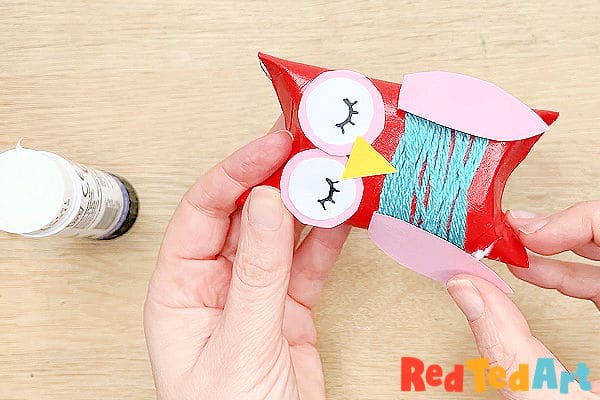 adding owl features to the paper tube