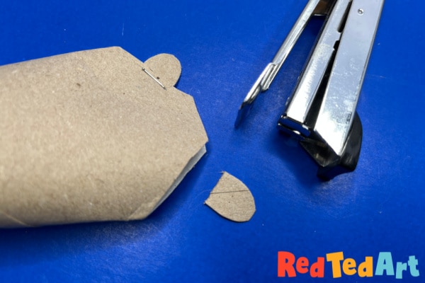 staple groundhog ears to toilet roll