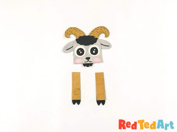 attach the hug legs to the goat head